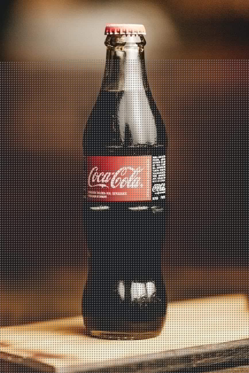 coca cola glass bottle macro photography